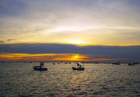 Landscape with sunset at the seashore and beautiful sky, Bangpha, Thailandの写真素材