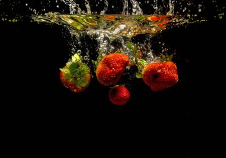 Photo of a vegetables dropped under waterの写真素材