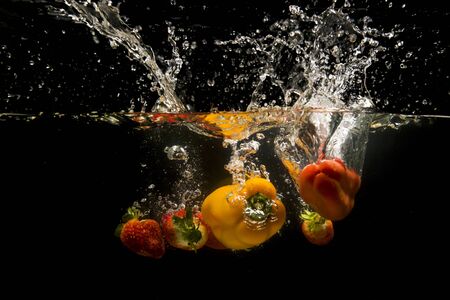 Photo of a vegetables dropped under waterの写真素材