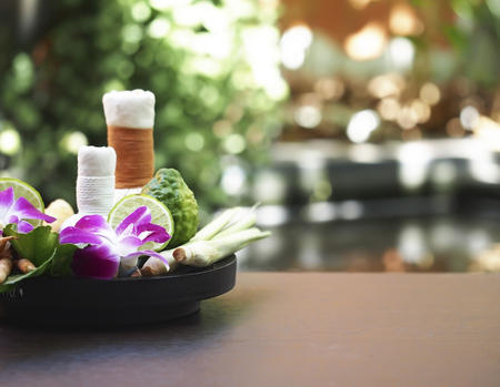Natural Spa Ingredients herbal compress ball and herbal Ingredients for alternative medicine and relaxation Thai Spa theme with silk fabricの写真素材