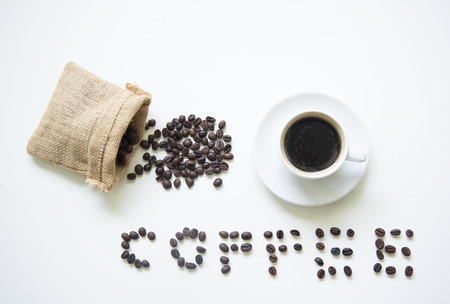 Coffee cup on wooden table white ,soft and select focusの写真素材