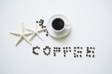 Coffee cup on wooden table white ,soft and select focusの写真素材