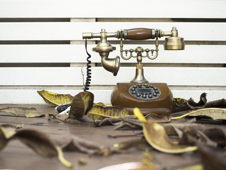 Retro and vintage telephone on blurry background, select focusの写真素材