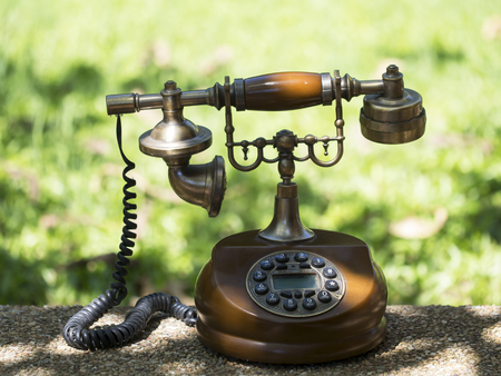 Retro and vintage telephone on blurry background, select focusの写真素材