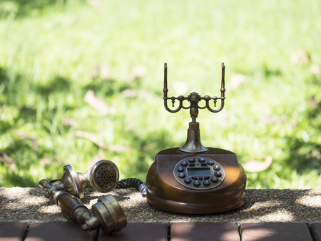 Retro and vintage telephone on blurry background, select focusの写真素材