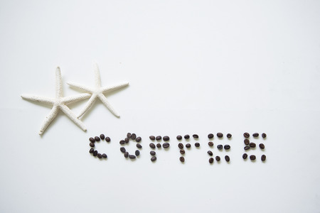 Coffee cup on wooden table white ,soft and select focusの写真素材