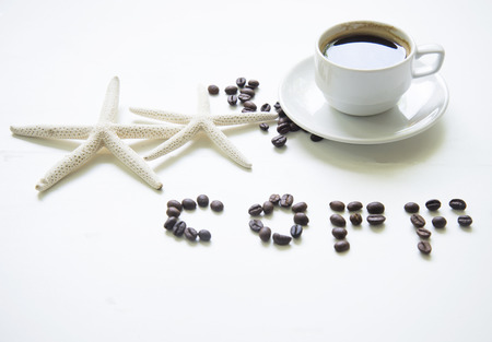 Coffee cup on wooden table white ,soft and select focusの写真素材