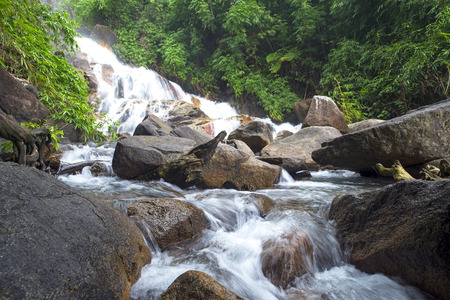 Waterfall in deep forest in national park in Chanthaburi, Thailandの写真素材