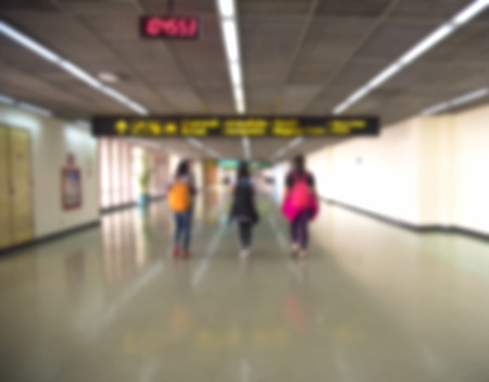 people in interior airport terminal building, blur backgroundの写真素材