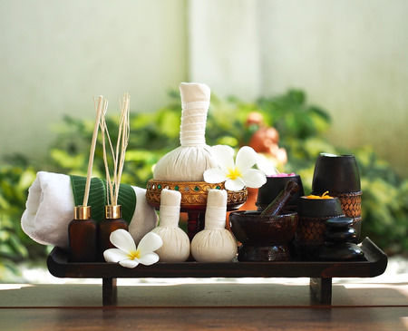 Spa massage compress balls, herbal ball on the wooden with treaments spa , Thailand, select focusの写真素材