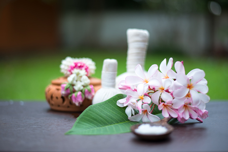 Spa massage compress balls, herbal ball on the wooden with treaments spa , Thailand, select focusの写真素材
