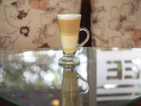 Coffee cup in the coffee shop, soft focusの写真素材