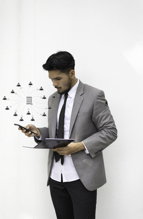 Business man button upload communication networkの写真素材