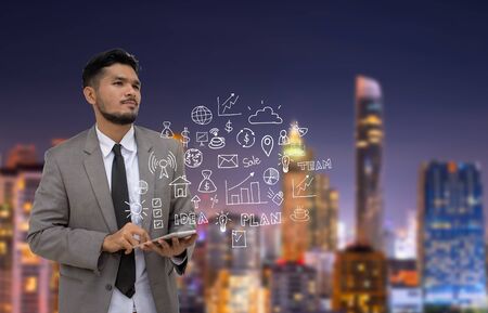 businessman leaning against with business strategy, doodle icon businessの写真素材