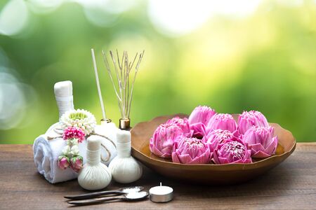 Spa treatment and massage with lotus folower Thailand, background green natureの写真素材