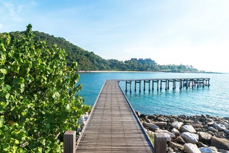 Wooden bridge to the oceanの写真素材