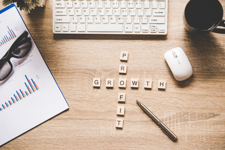 Words of business concepts collected in crossword with wooden cubes. Concept businessの写真素材