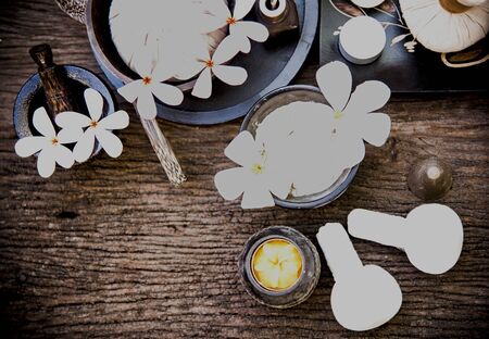 Thai Spa massage compress balls, herbal ball and treatment  spa with flower, Thailand.  Healthy Concept. select focusの写真素材