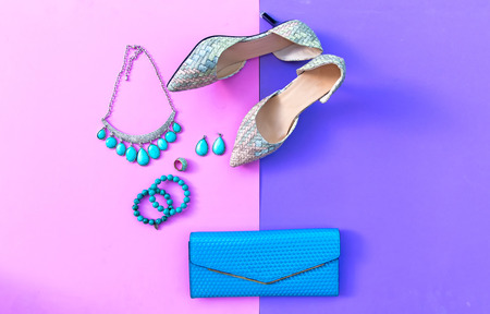 Fashion woman accessories set. Trendy fashion shoes heels, stylish handbag clutch, necklace, bracelet and ring. Lifestyle Concept.の写真素材