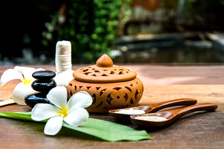 Thai Spa massage compress balls, herbal ball and treatment  spa with flower, Thailand.  Healthy Concept. select focusの写真素材
