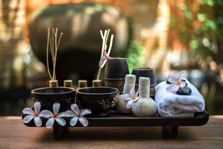 Thai Spa massage compress balls, herbal ball and treatment  spa with flower, Thailand.  Healthy Concept. select focusの写真素材