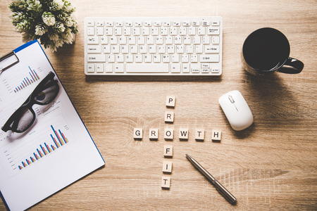 Words of business concepts collected in crossword with wooden cubes. Concept businessの写真素材