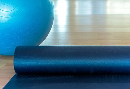 Yoga ball and map in fitness room, select focus.  Healthy Concept.の写真素材