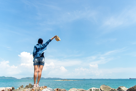 Happy and relax woman on the beach in summer day.  Travel Conceptの写真素材