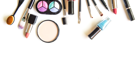 Cosmetics and fashion background with make up artist objects: lipstick, eye shadows, mascara ,eyeliner, concealer, nail polish.  Lifestyle Conceptの写真素材