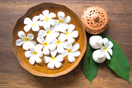 Thai Spa massage compress balls, herbal ball and treatment  spa, relax and healthy care with flower, Thailand.  Healthy Concept. select focusの写真素材