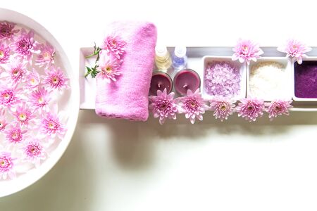 Thai Spa Treatments aroma therapy  salt and sugar scrub and rock massage with pink flower on wooden white.  Healthy Concept. copy space,select and soft focusの写真素材