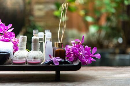 Thai Spa Treatments aroma therapy  salt and sugar scrub and rock massage with orchid flower on wooden white.  Healthy Concept. copy space,select and soft focusの写真素材