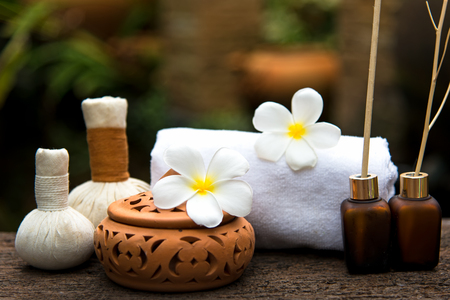 Thai Spa massage compress balls, herbal ball and treatment  spa, relax and healthy care with flower, Thailand.  Healthy Concept.の写真素材