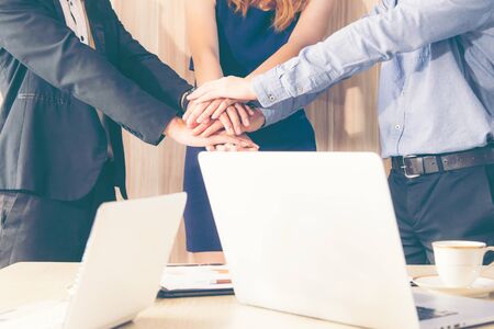 Business partner people joining hand after contract finished meeting. Teamwork Concept.の写真素材