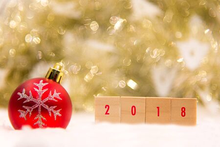 Christmas decorative with gift box and snowflake.  Merry Christmas and Happy New Year 2018 text on light background.の写真素材