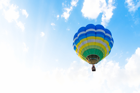 Hot air colorful Balloon flying in the blue sky.の写真素材