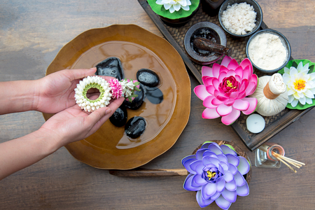 Thai Spa treatment and product for female feet and manicure nails spa wet with lotus flowers, Thailand. Healthy Concept.の写真素材
