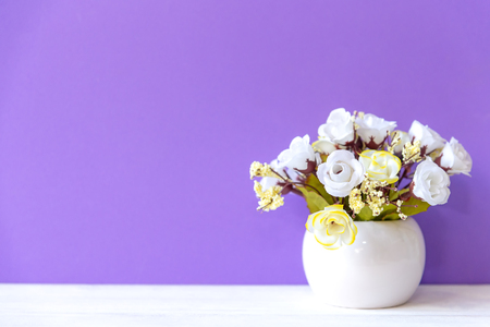 Purple wall with calla white flower on shelf white wood, copy space for text. Still life Conceptの写真素材