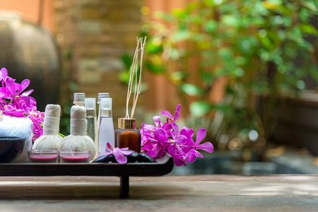 Thai Spa Treatments aroma therapy  salt and sugar scrub and rock massage with orchid flower on wooden white.  Healthy Concept. copy space,select and soft focusの写真素材