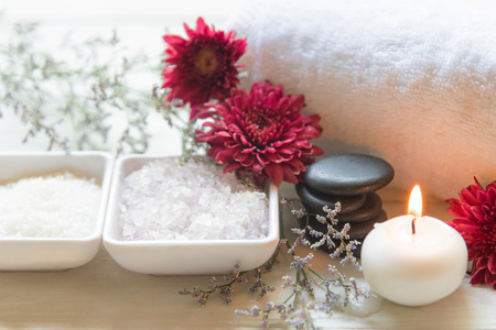 Thai Spa Treatments aroma therapy salt and sugar scrub and rock massage with red flower with candle. Thailand. Healthy Conceptの写真素材