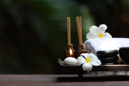 Thai Spa Treatments aroma therapy salt and sugar scrub and rock massage with frangipani plumeria flower with candle. Thailand. Healthy Concept. copy spaceの写真素材