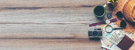 Top view of Traveler accessories and items man with black for planning travel vacations on the world for text banner and copy space. Travel and Summer holiday conceptの写真素材