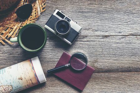 Top view of Traveler accessories and items man with backpack and visiting for planning travel vacations on the world, copy space.  Travel and Summer holiday conceptの写真素材