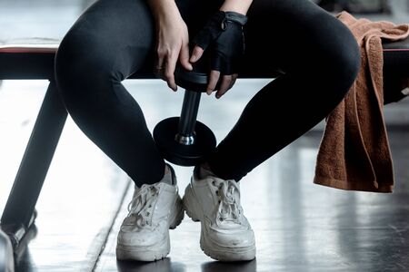 Close up hands Lifestyle women battle ropes session in functional training exercise  and cross fit...