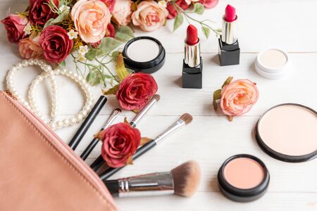 Makeup beauty cosmetic fashion set background. Cosmetics woman bag product facial, lipstick and items decorative composition flat lay on white background.Â  Lifestyle fashion Valentine Gift Conceptの写真素材