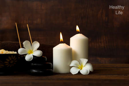 Thai spa massage.  Spa body treatment and beauty wellness. Therapy aromatherapy for body women with candles for relax spa massage and wellness setting ready healthy lifestyle.の写真素材