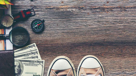 Traveler accessories and items man with tourism backpack and visiting for planning trips travel destination and vacations on the world, top view. Travel and Summer holiday conceptの写真素材