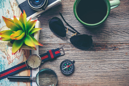 Traveler accessories and items man with tourism backpack and visiting for planning trips travel destination and vacations on the world, top view. Travel and Summer holiday conceptの写真素材
