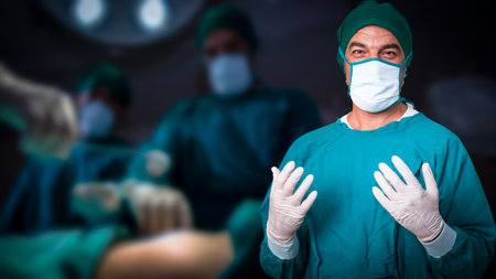 Group and teamwork of surgeons in the hospital operating room. Teamwork medical doctor working ...