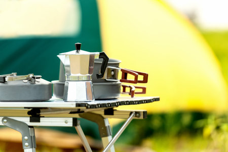Party Camping.  Item camping with tents for night party  family and friends travel enjoy party and roasted sausages relax in vacations. Campfire at touristic camp at nature in outdoor forest.  Travel Conceptの写真素材